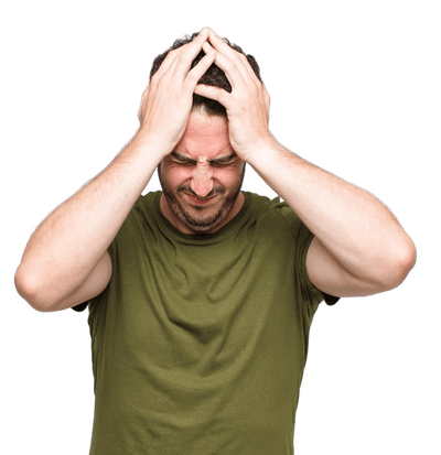 Man in a green shirt holding his head in distress from anxiousness, stress and restlessness.